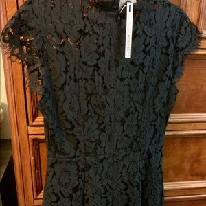 NWT-Merokeety Black lace dress. Very flattering style. Never worn.
